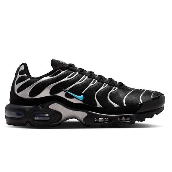 A side view of the Nike Air Max Plus VII Scorpion Black trainer, showing the sleek black upper, sculpted overlays and visible Air cushioned sole.