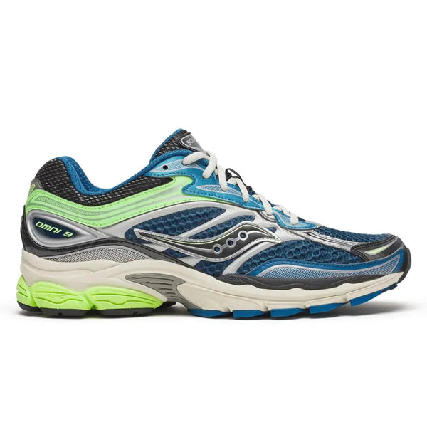A side view of the Saucony ProGrid Omni 9 Blue Lime trainer, showing the blue mesh upper, electric lime detailing, signature Saucony wave logo and sculpted ProGrid sole.